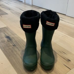 Hunter green original short rain boot with black Hunter socks.